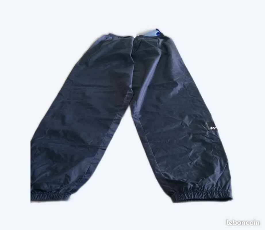Pantalon coupe vent taille M de marque Queshua (image 1)