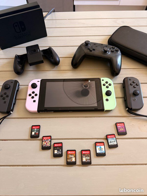 Switch + 4 Joy-Con + Pro Controller + 8 juegos + microSD 250 Go + dock + grip + housse (image 1)