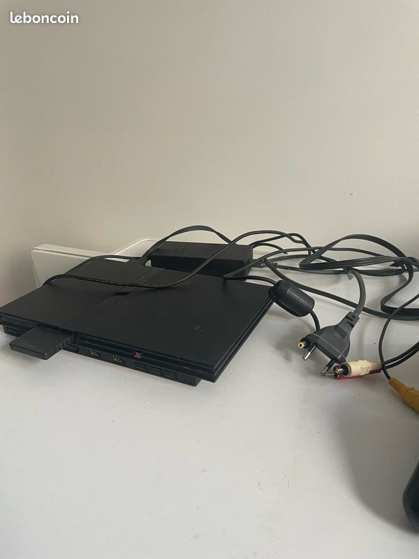 PlayStation 2 slim + manettes + jeux (image 3)