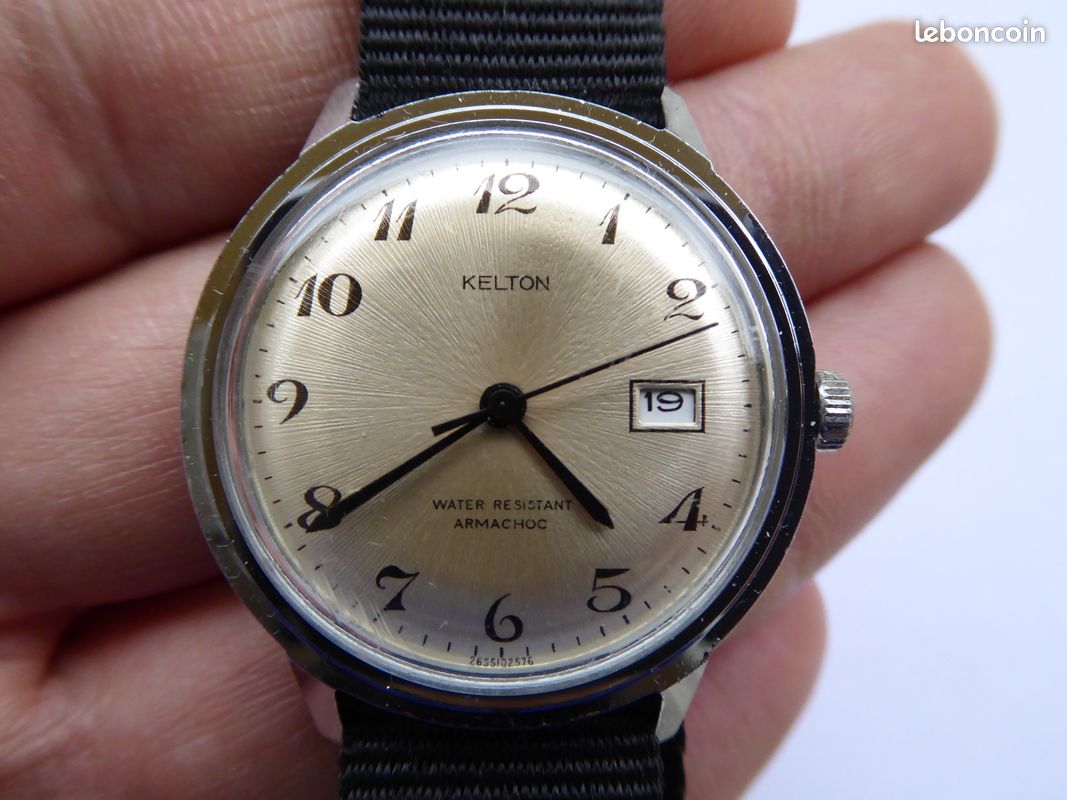 Montre Homme KELTON Mécanique – Cadran Blanc, Bracelet Marron En Plastique, Style Classique Occasion