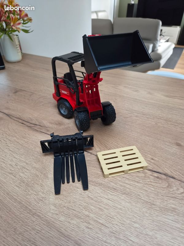 Chargegeuse Chargeuse articulée avec accessoires Bruder comme neuve - Jeux & Jouets