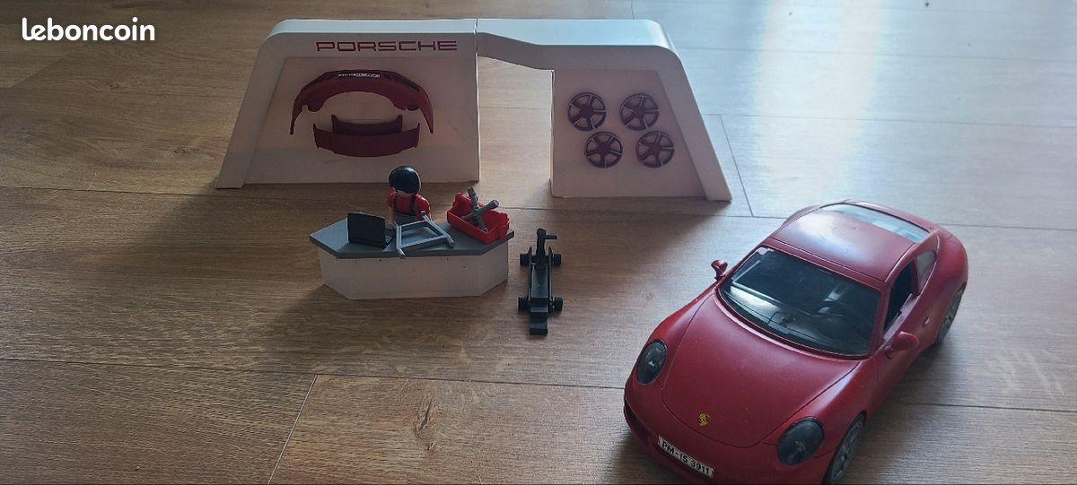 Garage porsche playmobile avec toute les pièce comprise ( roux de rechange , châssis de rechange , o (image 1)