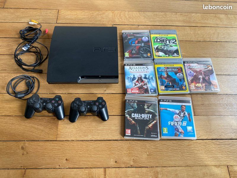 PS3 + 2 manettes + 7 jeux (image 1)