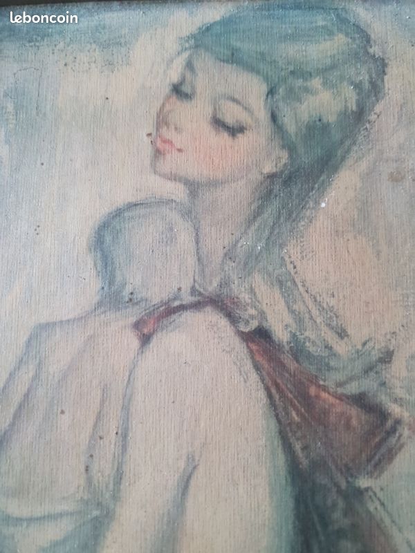 Dame avec son bébé dans les bras (image 3)
