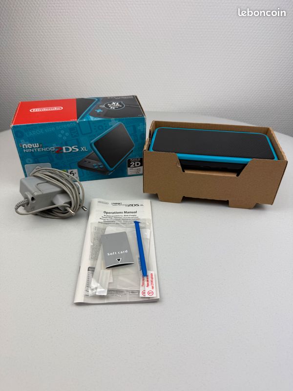 Nintendo new 2ds xl bleu et noire en boite (image 1)