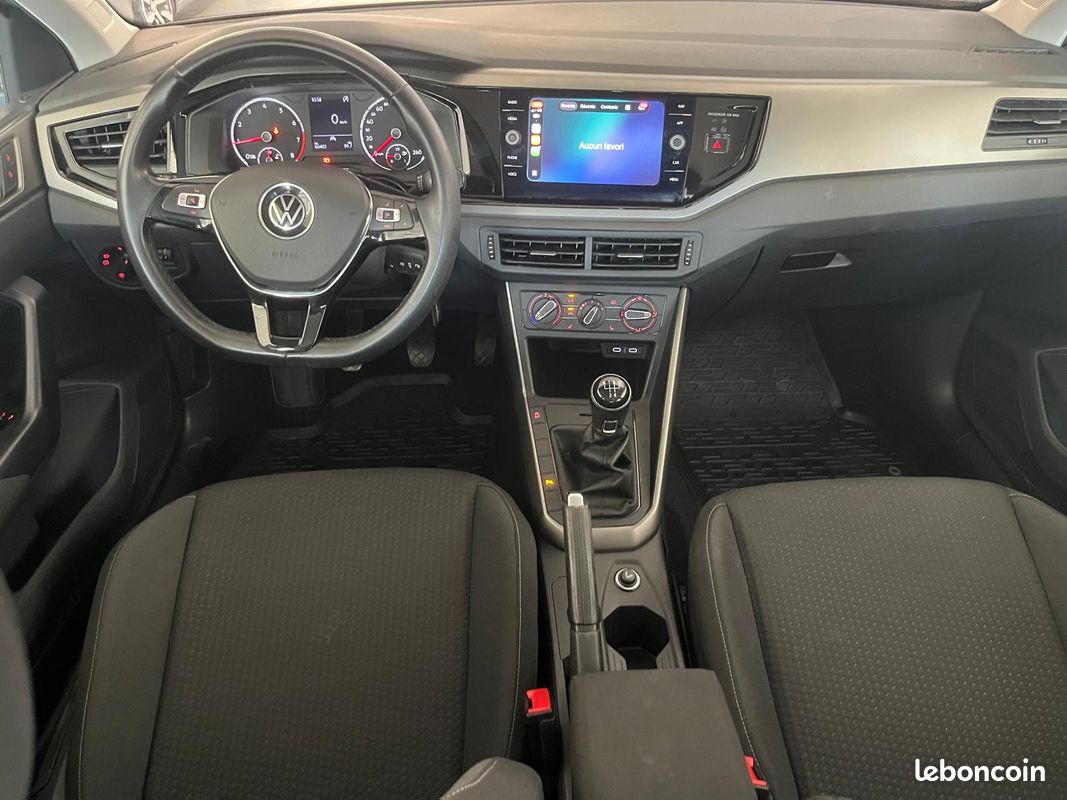 VOLKSWAGEN POLO 1.0 l TSI 95 CH EDITION + 2021 / JANTES ALU BI-TONS / CARPLAY SANS FIL / RADARS AVANT + ARRIERE / ECRAN / SIEGES CHAUFFANTS / CHARGEUR INDUCTION (image 7)