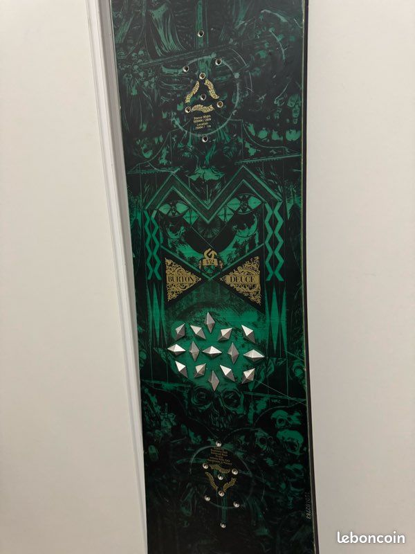 1999 burton snowboard with dinasaur What are the names of two vintage Burton snowboards from 1999?
