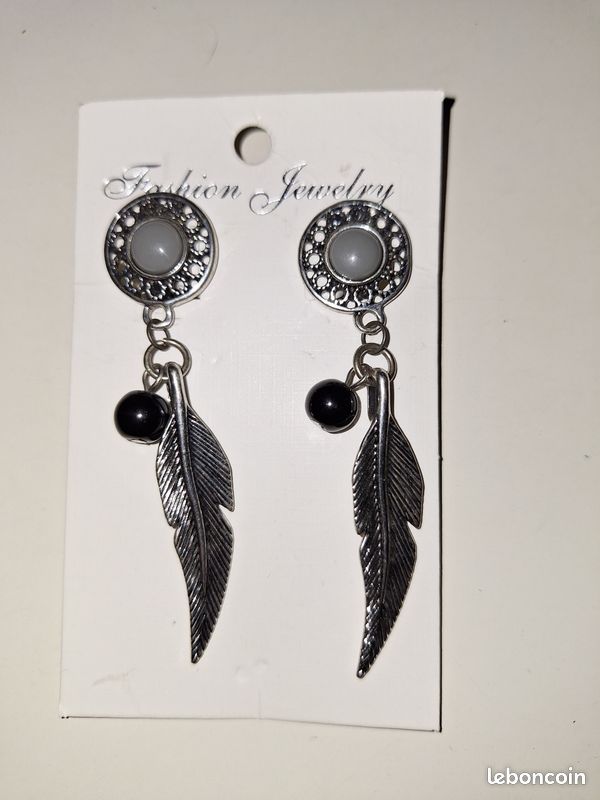 Boucles d'oreilles clip plume (image 1)