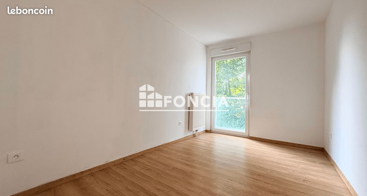 Appartement T3 avec balcon et parking privatif (image 6)
