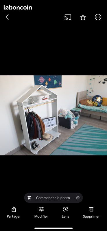 Portant enfant (image 1)