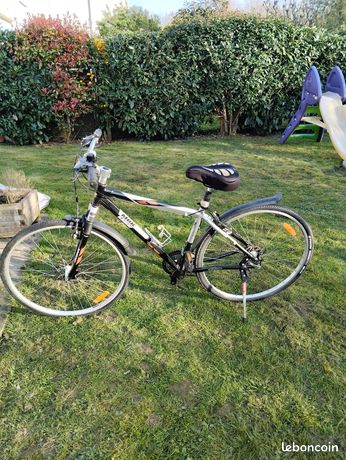 VTT Femme MBK Grenat 18 Vitesses Fourche Rock Shox Suspension Avant