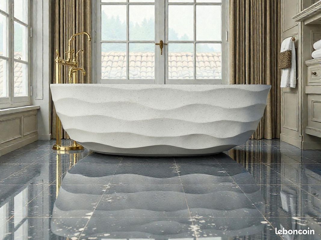 đ Baignoire en pierre offrant un rendu luxueux et une finition artisanale soignĂ©e (image 1)
