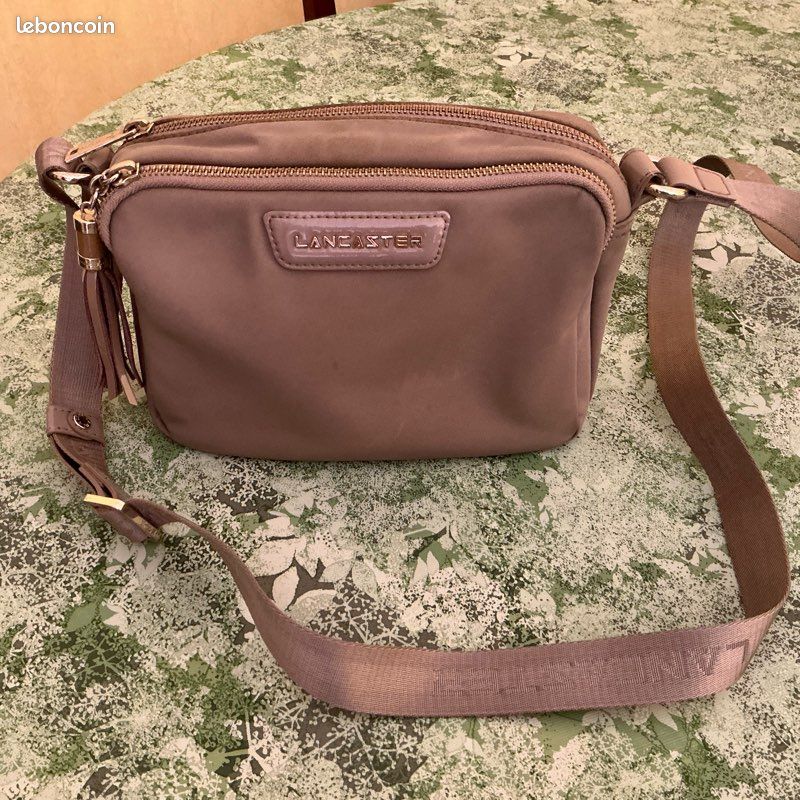 Petit sac beige porté travers marque Lancaster (image 1)