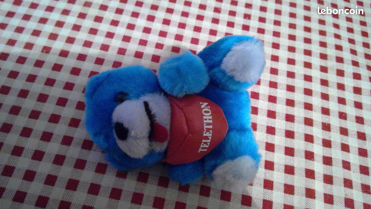 Peluche n° 28 ourson bleu telethon (image 1)