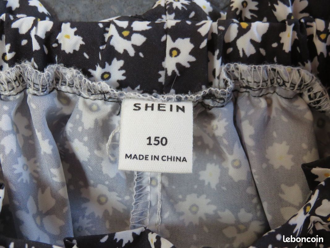 Jupe SHEIN fille NEUVE 12 ans noire fleurs Vêtements