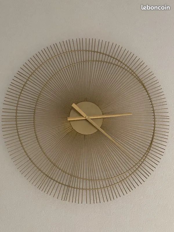 Horloge dorée soleil maison du monde (image 1)