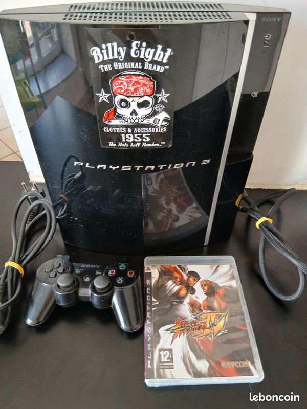 Ps3 fat avec un jeu et une manette (image 1)