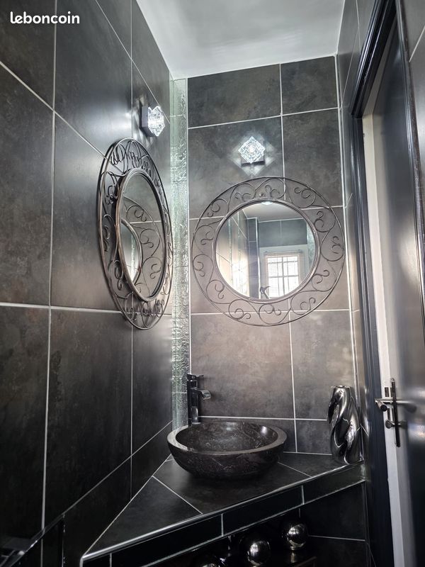 Lot 2 Miroirs métal noir gris - Diam. 68 cm dont 1 offert (image 1)