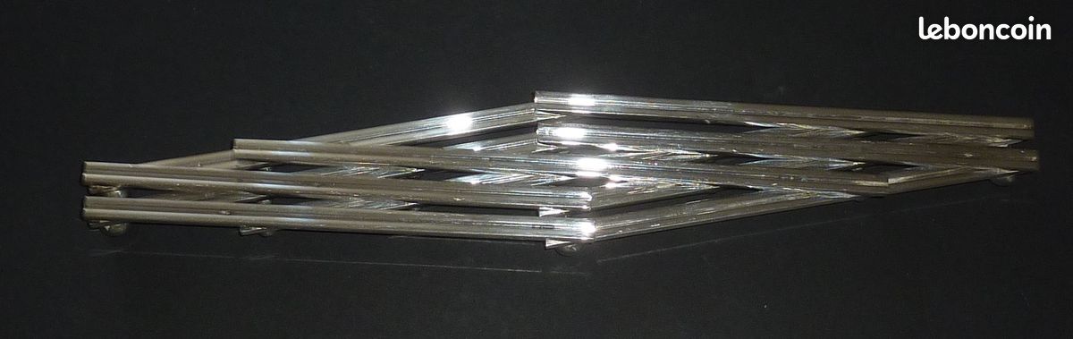 Dessous de plat acier inoxydable extensible