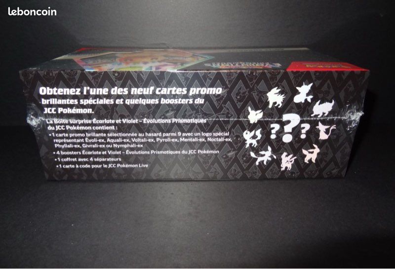 Pokémon Boîte Surprise Écarlate Et Violet – Évolutions Prismatiques : 4 Boosters + 1 Carte Promo Brillante Exclusive