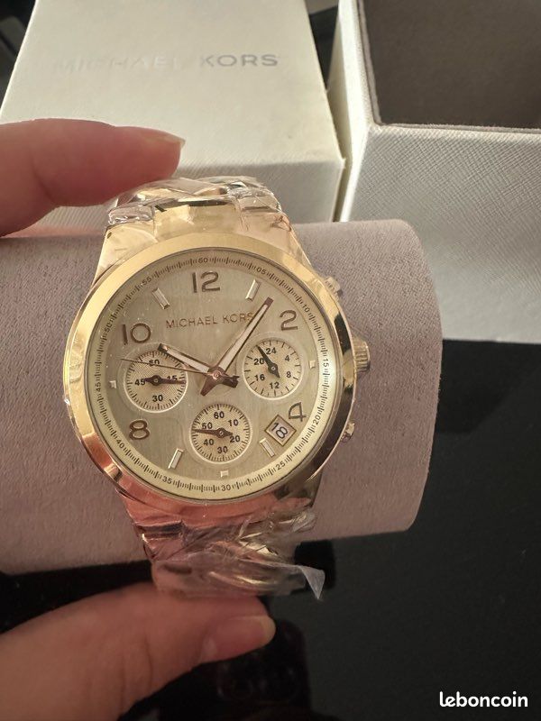 Montre Michael Kors doré (image 1)