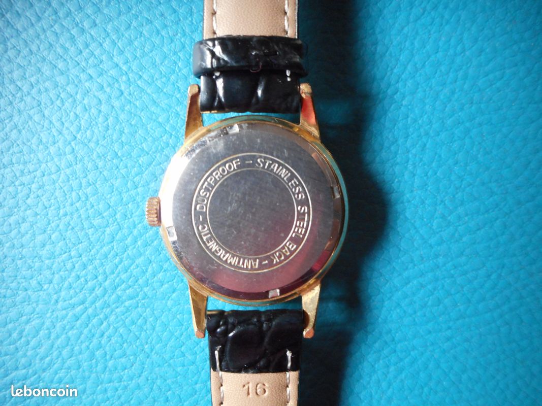 Ancienne montre homme Action Montres Bijoux - Main Image