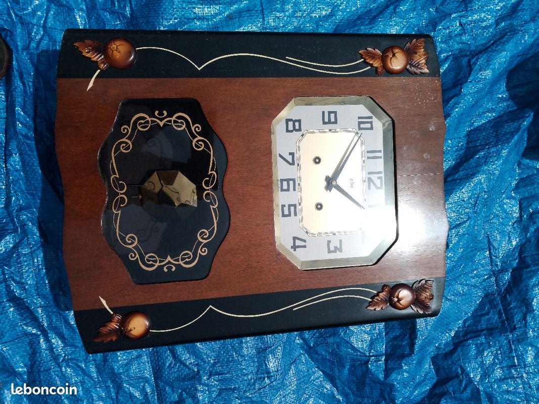 Petite horloge murale à balancier (image 1)