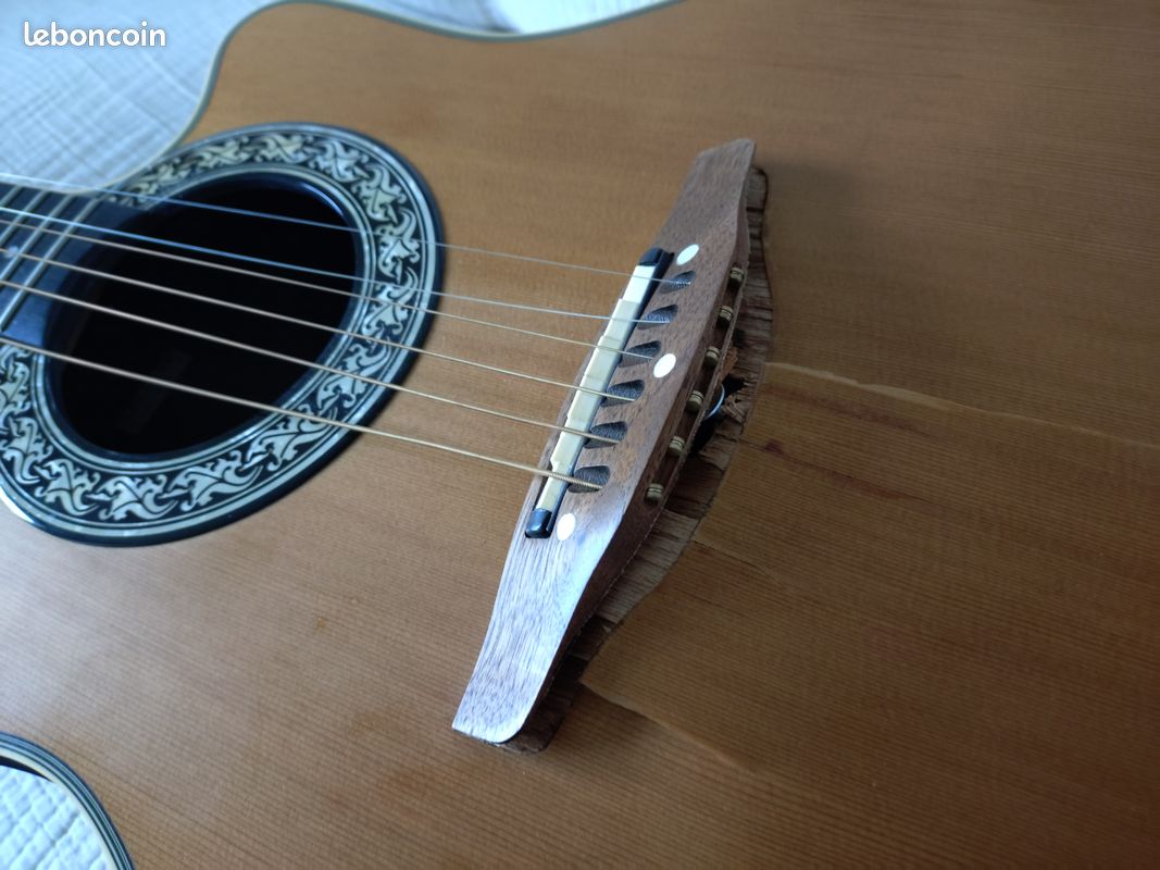 Don de guitare cassée (image 1)
