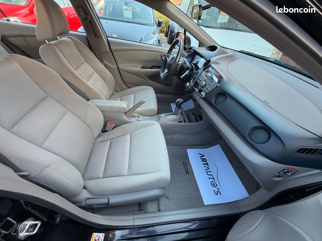 HONDA INSIGHT 1.3 I-Vtec HYBRIDE 102 CH / Edition Elegance / CLIM AUTO / Feux Xenon / Boute auto / JANTES Alu / Sièges Chauffants / PREMIERE MAIN CARNET COMPLET HONDA (image 6)