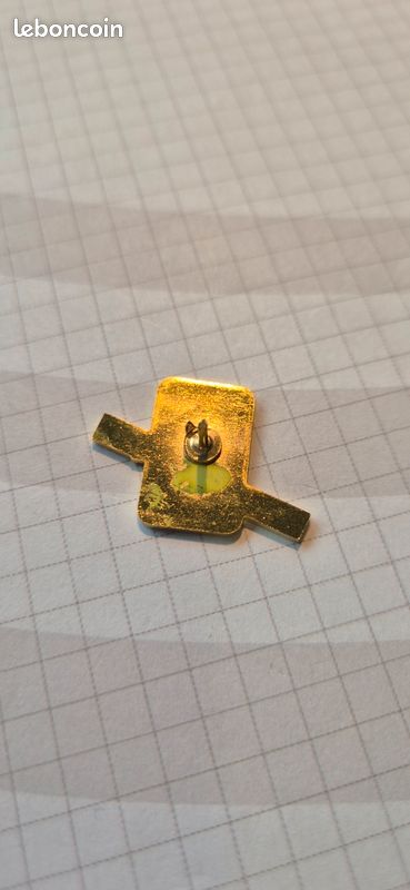Pin's Tac o Tac jaune (image 2)