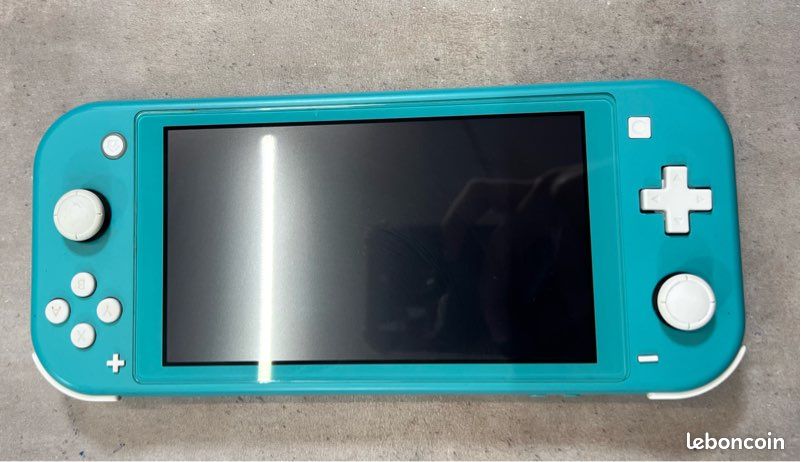 Switch lite + 60 jeux (image 1)