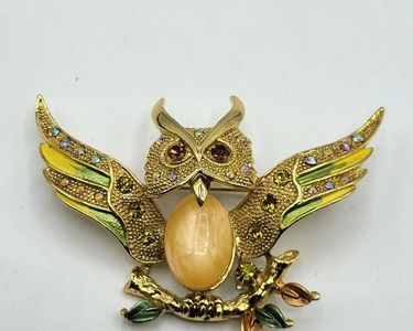 Broche vntage bleue Janus en strass scntllants avec boucle pour la