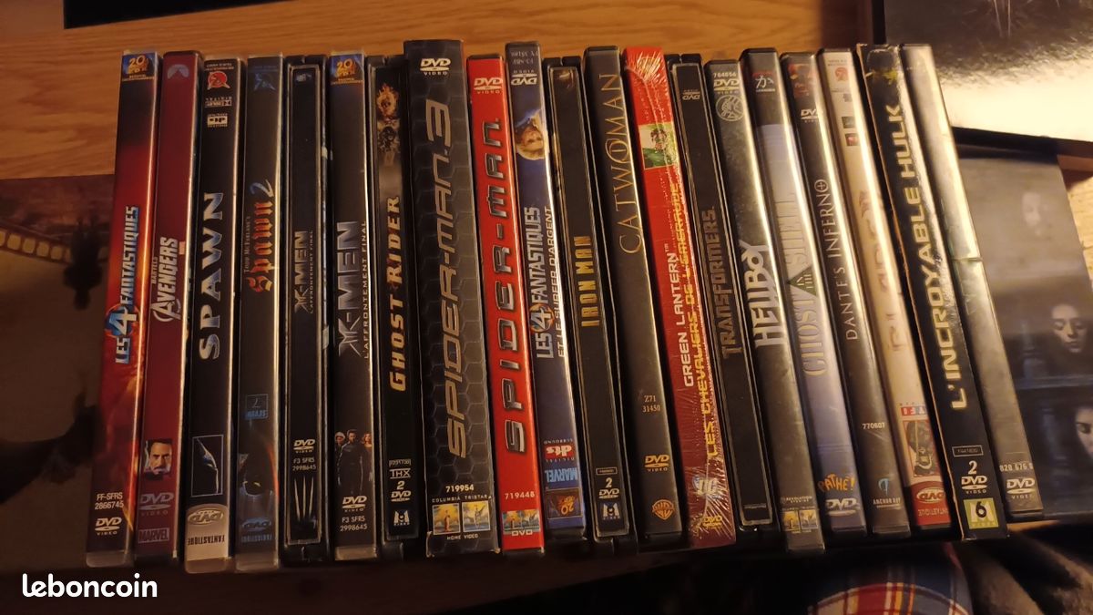 Lot 20 DVD COMICS VOIR PHOTOS (image 1)