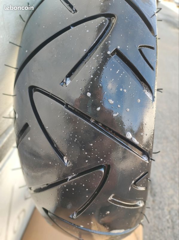 Pneu continental 140/60/13 (image 1)