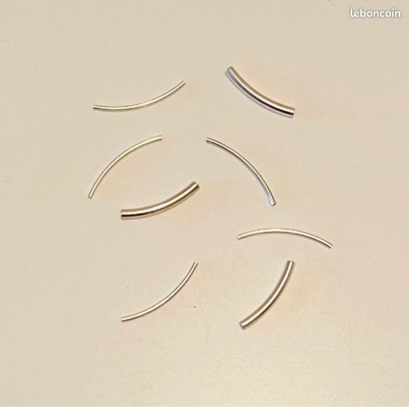 Perles tubes métal incurvées (image 1)