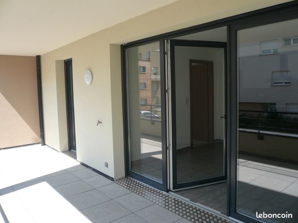 F2 à Lutterbach, BBC, terrasse sud 20 m2, parking privatif