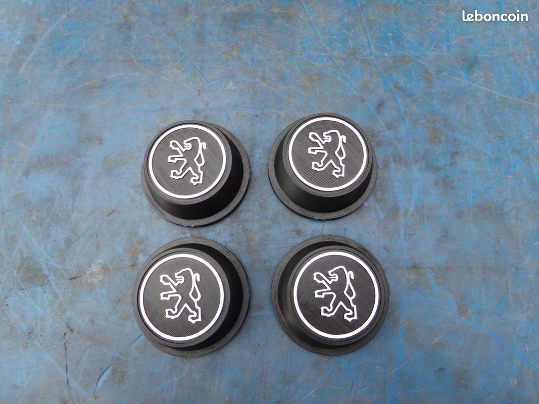 4 centres de roues Peugeot 205 (image 1)