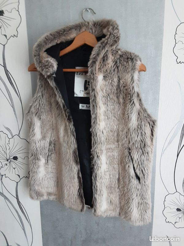 Veste sans manches avec capuche fourrure Vêtements