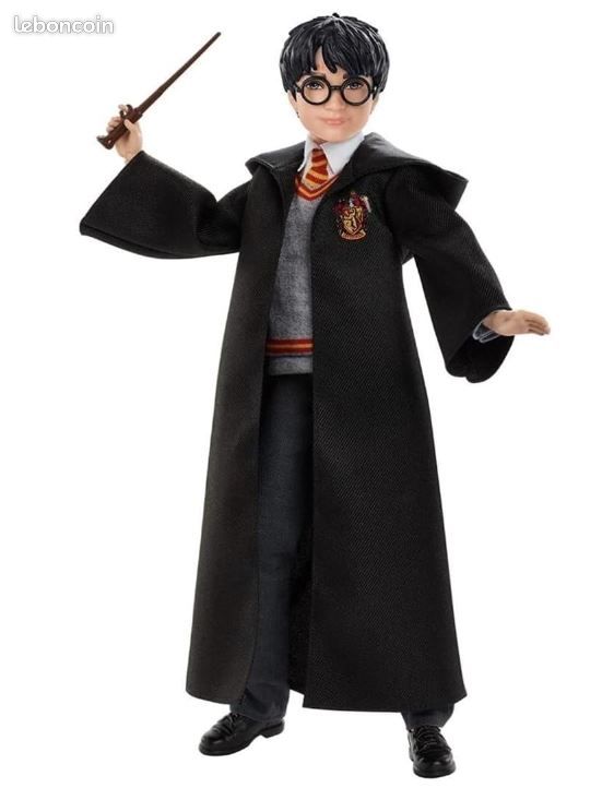 Harry Potter Poupée articulée d'Hermione Granger de 24 cm en uniforme  Gryffondor en tissu avec baguette magique