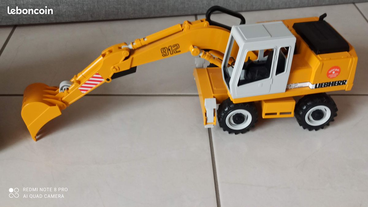 Bruder Camion Benne Man TGA avec pelleteuse Liebherr | Rakuten