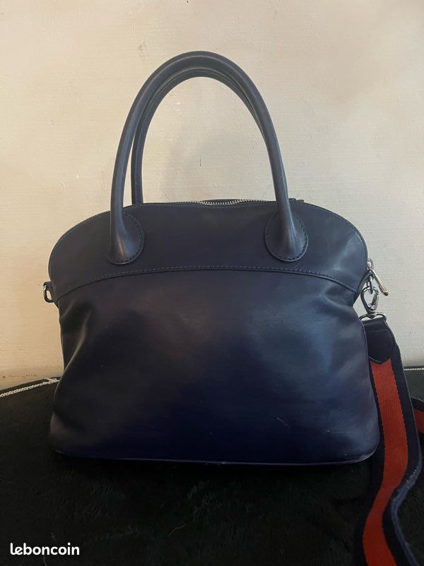 Sac à main au bandoulière longchamp en cuir bleu marine