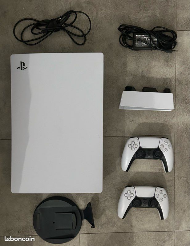 PS5 Standard + 2 manettes + station de recharge + 11 jeux PS4/5 (image 1)