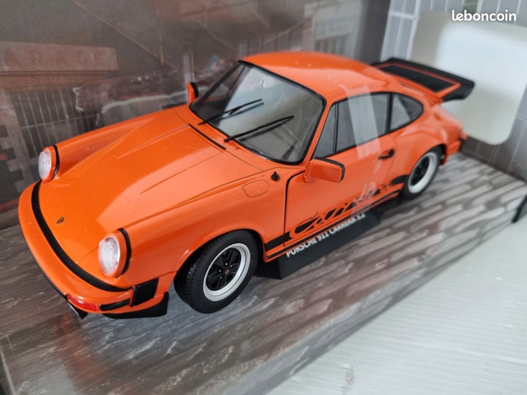 Xe mô hình Porsche 911 3.0 Carrera Orange 1977 1:18 Solido (Cam) - Shop Xe Mô Hình Tĩnh