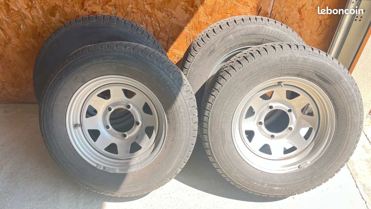 4 Roues completes montées pneus neige pour SUZUKI JIMNY (image 1)