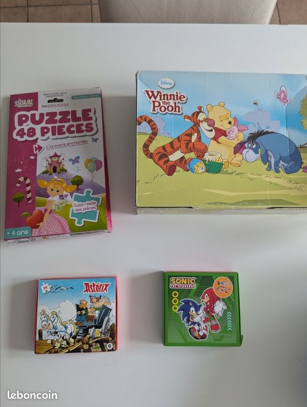 Lot 7 puzzles princesse Winnie l'ourson sonic asterix (image 1)