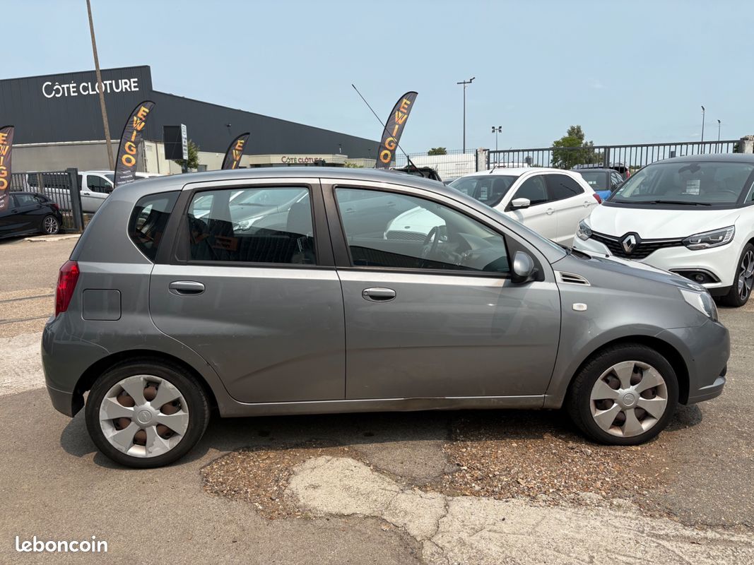 Chevrolet aveo 1.2 gpl 80ch - climatisation - vitres av elec (image 7)