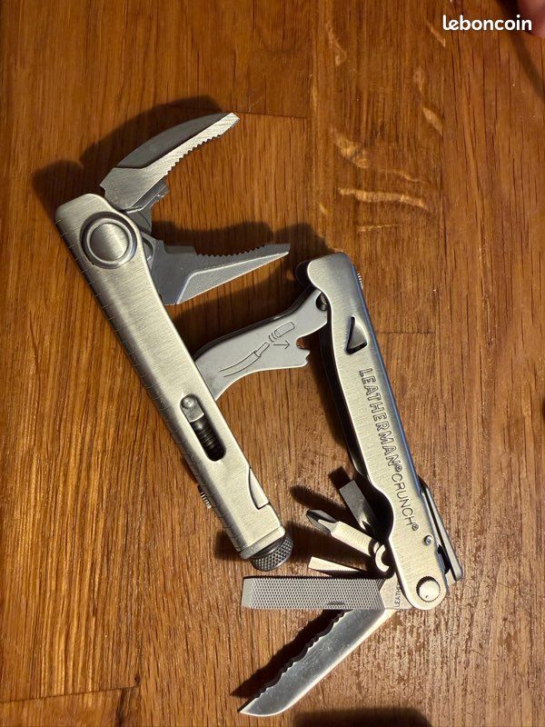 A Leatherman Crunch multi tool - boxed