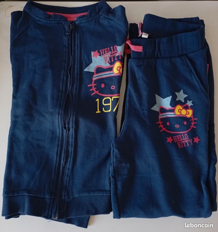 Ensemble veste et pantalon . 7/8 ans . Hello Kitty. Coton bleu et imprimé . Très bon état (image 1)