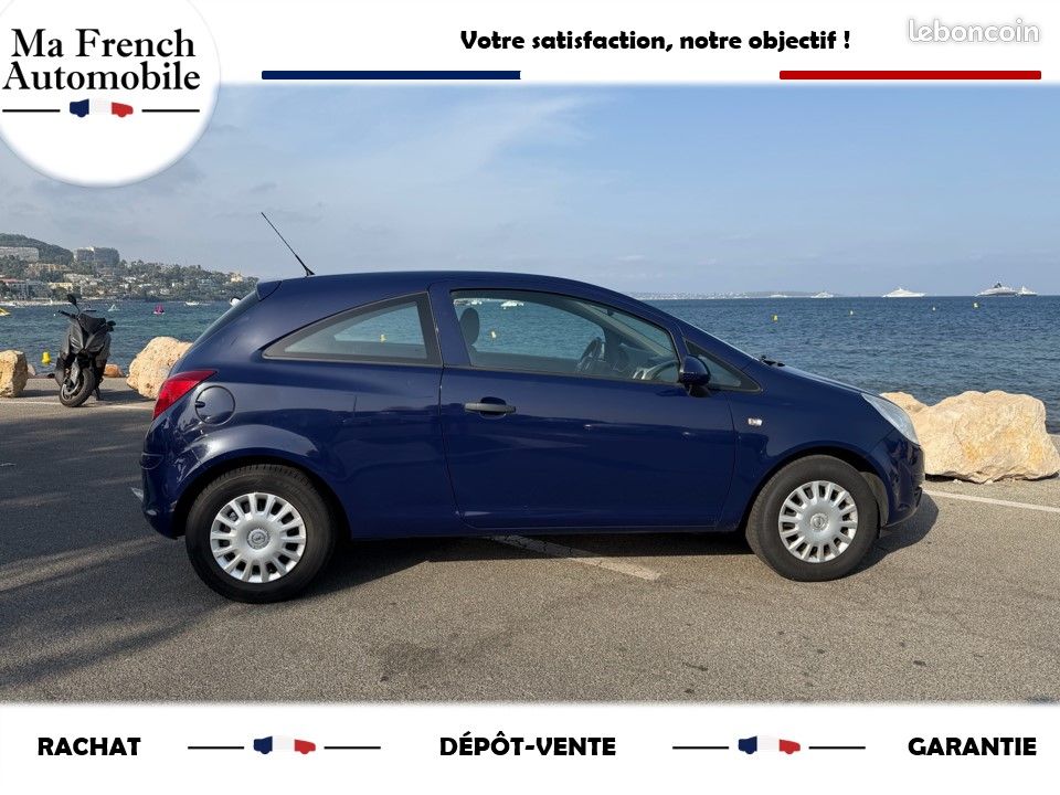 OPEL CORSA D 60ch - 1 ER MAIN - ENTRETIEN A JOUR - 3 CLÉS - GARANTIE - IDÉAL JEUNE CONDUCTEUR - RADIO - KIT ANTI-CREVAISON - PRISE 12V - ISOFIX - RÉGLAGE VOLANT - TAPIS CAOUTCHOUC - PROTEGE COFFRE (image 5)