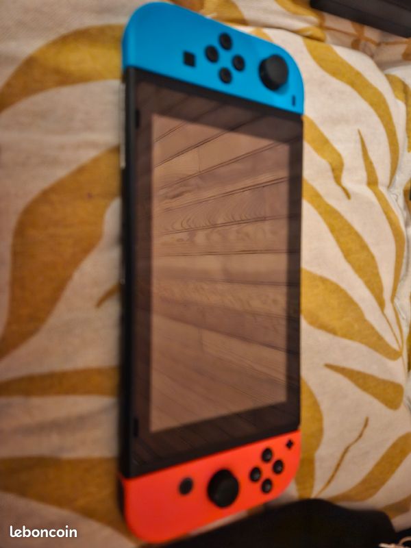Nintendo Swicth + jeux (image 1)
